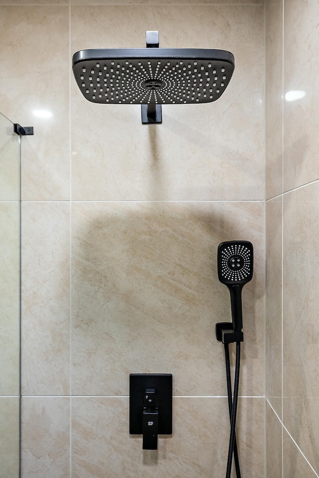 details with a tile shower