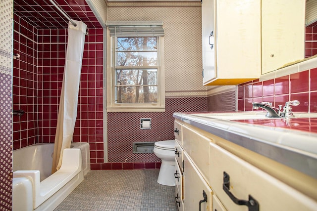 full bathroom with shower / bathtub combination with curtain, tile patterned floors, backsplash, toilet, and vanity