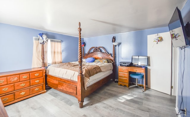 bedroom featuring wood-type flooring