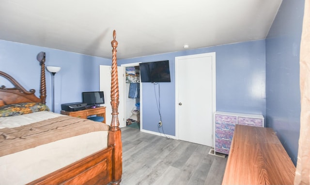 bedroom featuring hardwood / wood-style floors