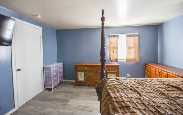 bedroom featuring hardwood / wood-style floors