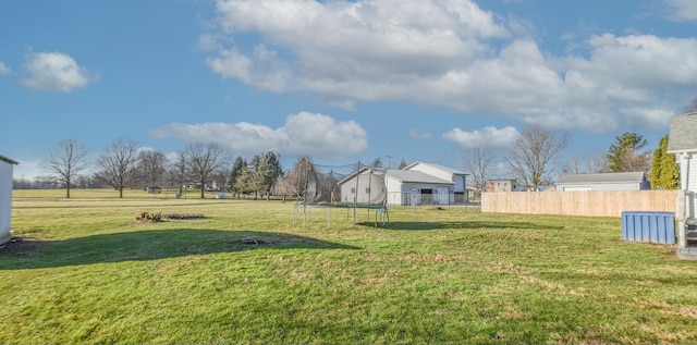 view of yard featuring a trampoline