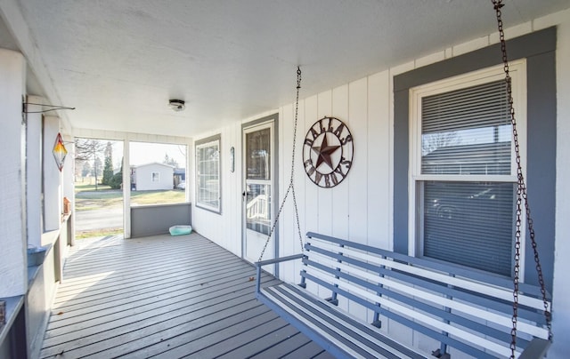 deck featuring covered porch