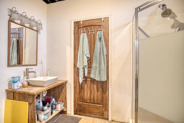 bathroom with vanity and walk in shower