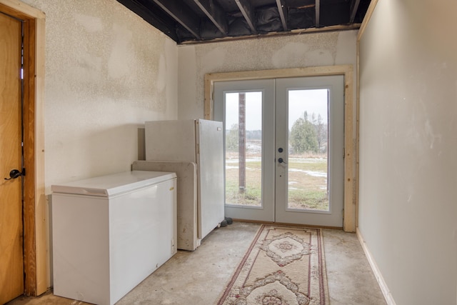 laundry area featuring french doors