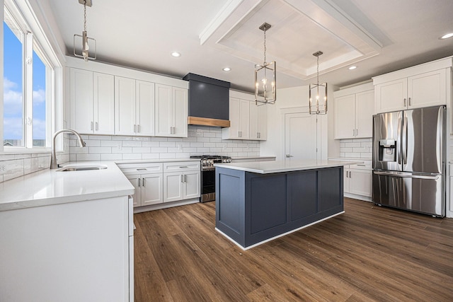 3545 Conrail Dr, Byron Center, MI 49315 - kitchen featuring appliances with stainless steel finishes, a sink, custom range hood, dark wood-style floors, and a center island