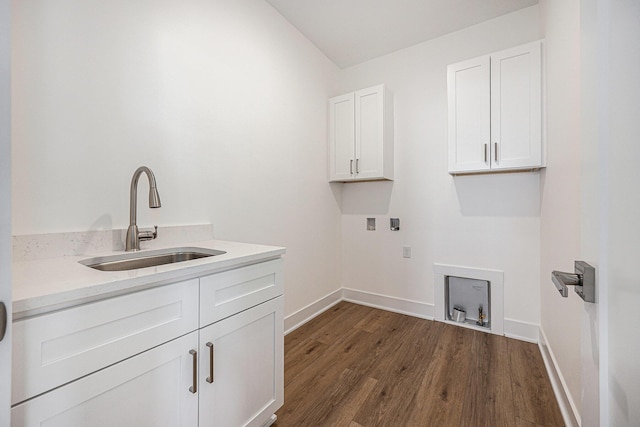 3545 Conrail Dr, Byron Center, MI 49315 - laundry area with washer hookup, cabinet space, dark wood-style flooring, and baseboards