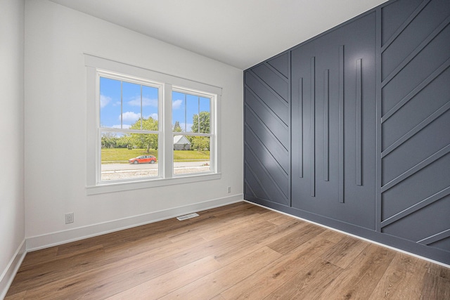3545 Conrail Dr, Byron Center, MI 49315 - unfurnished bedroom featuring baseboards and light wood-type flooring