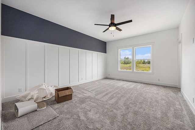3545 Conrail Dr, Byron Center, MI 49315 - unfurnished bedroom with carpet, a ceiling fan, and baseboards