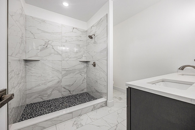 3545 Conrail Dr, Byron Center, MI 49315 - bathroom featuring tiled shower, marble finish flooring, double vanity, recessed lighting, and toilet
