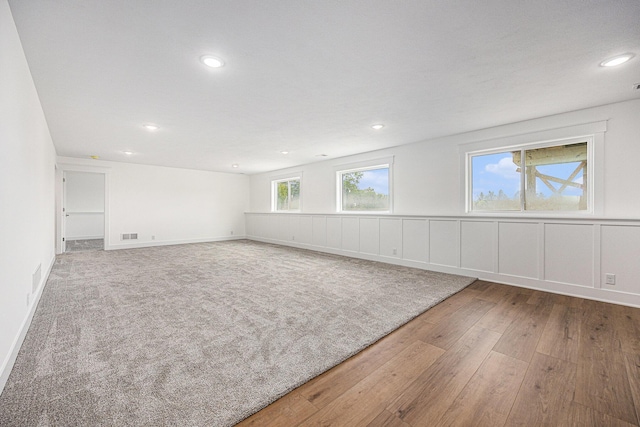 3545 Conrail Dr, Byron Center, MI 49315 - unfurnished room featuring hardwood / wood-style floors, recessed lighting, and baseboards