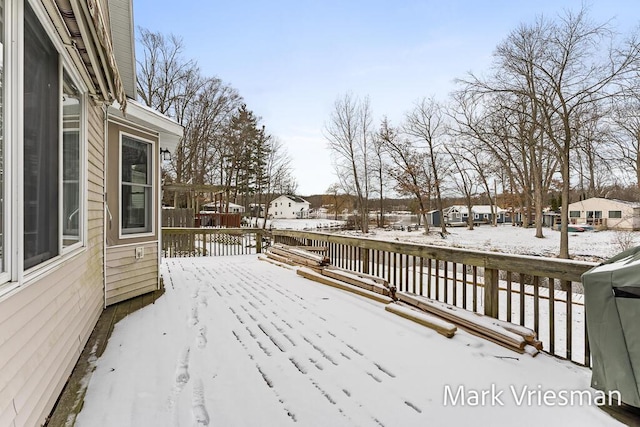 view of snow covered deck