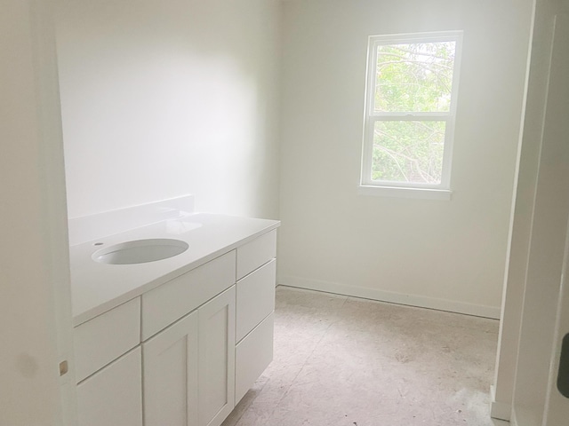 1979 N Shorewood Ln Unit 7, Holland, MI 49423 - bathroom with vanity and baseboards