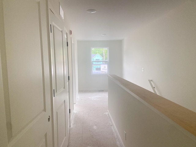 1979 N Shorewood Ln Unit 7, Holland, MI 49423 - corridor featuring an upstairs landing