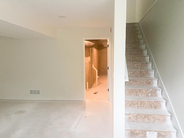 1979 N Shorewood Ln Unit 7, Holland, MI 49423 - staircase with concrete flooring