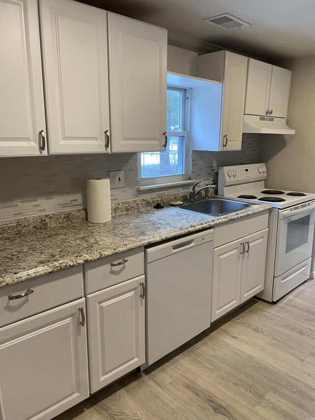 kitchen featuring white electric range, sink, dishwashing machine, light hardwood / wood-style floors, and white cabinetry