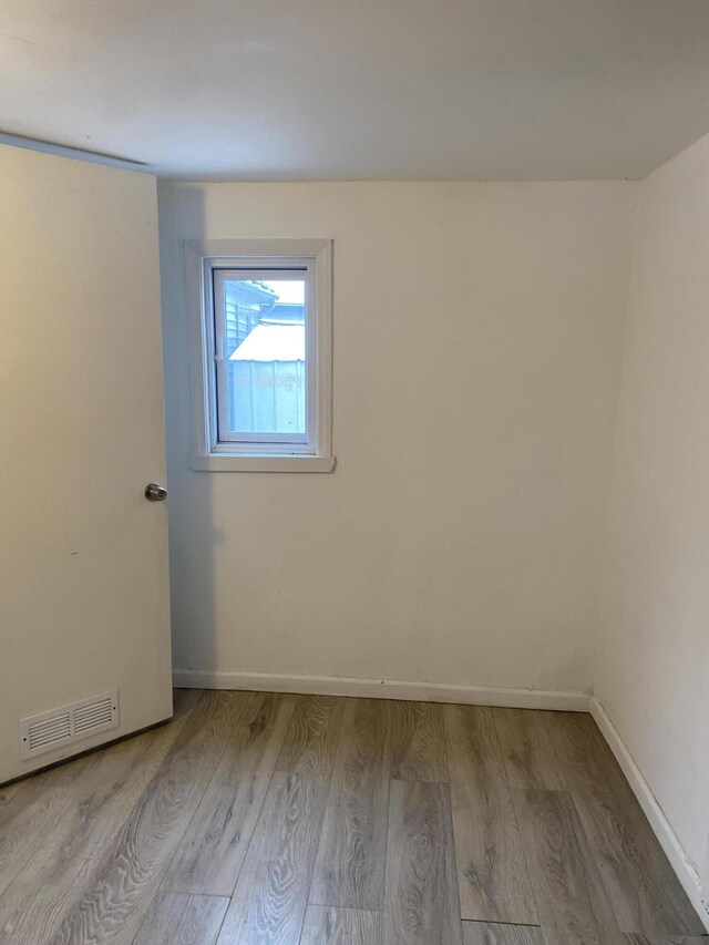 empty room featuring light hardwood / wood-style floors