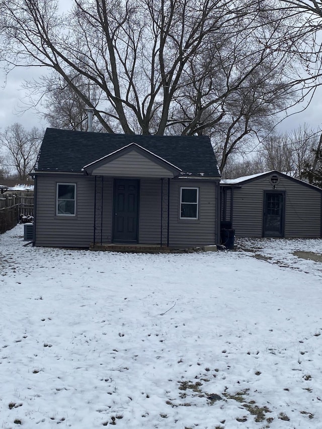 view of front of property with cooling unit