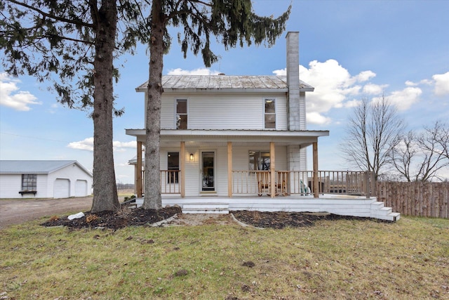 view of front facade with a porch and a front lawn