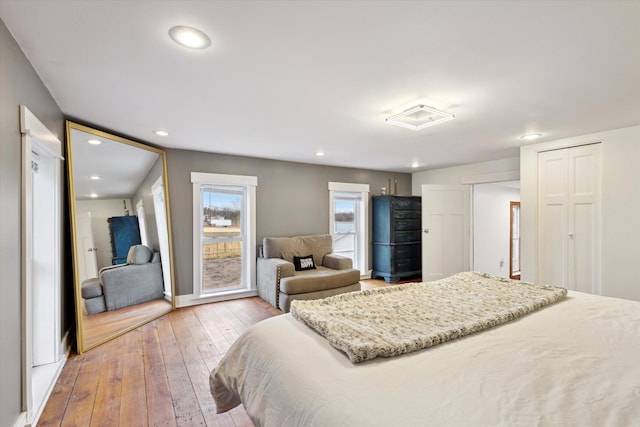 bedroom with wood-type flooring