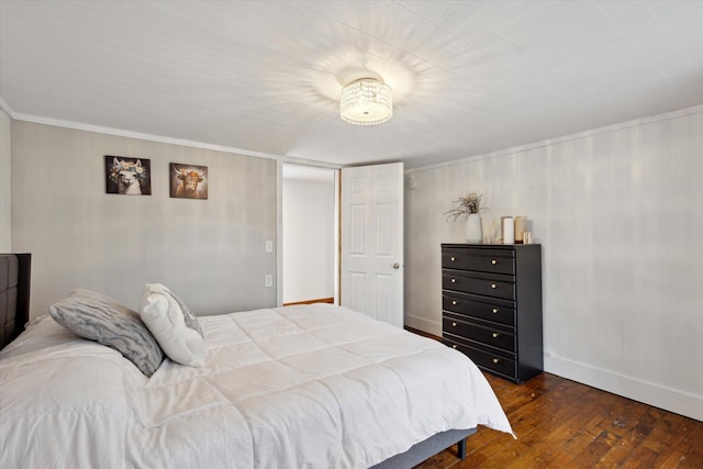 bedroom featuring dark hardwood / wood-style floors