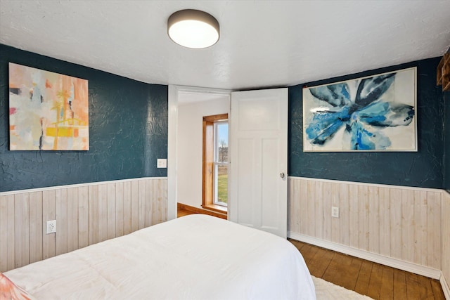 bedroom featuring hardwood / wood-style flooring