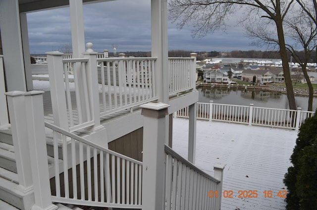 deck featuring a water view