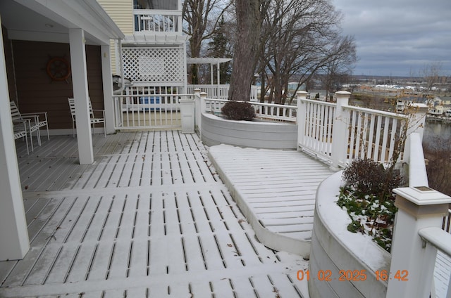 view of snow covered deck