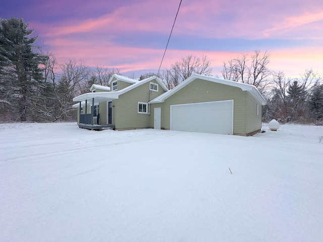 view of front of property with a garage