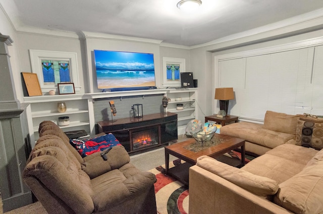 living room with built in shelves and ornamental molding