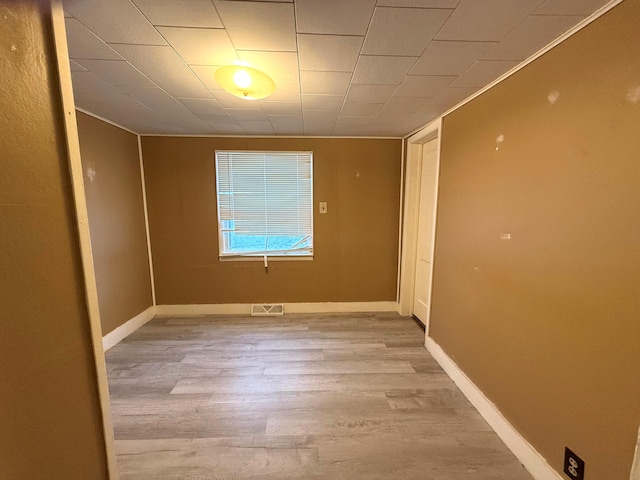 empty room with light wood-type flooring