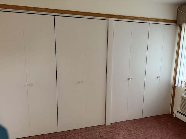 closet with a baseboard radiator