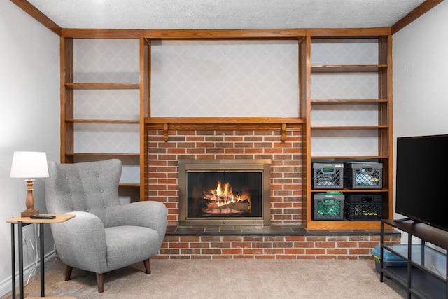 living room with carpet flooring, a brick fireplace, and ornamental molding