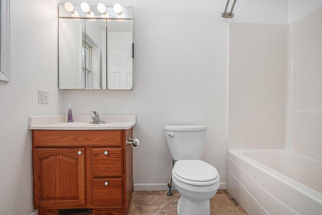 full bathroom featuring vanity, shower / bathtub combination, and toilet