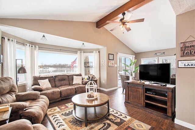 living room with vaulted ceiling with beams, ceiling fan, and dark hardwood / wood-style flooring