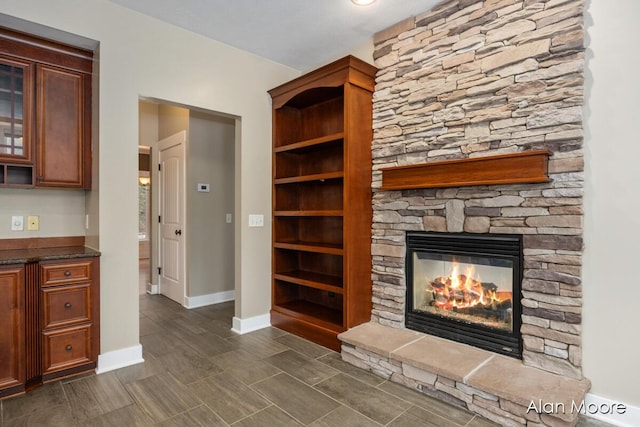 unfurnished living room with a fireplace