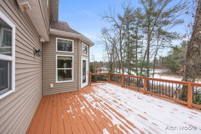 view of snow covered deck