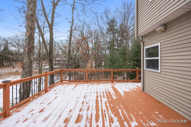 view of snow covered deck