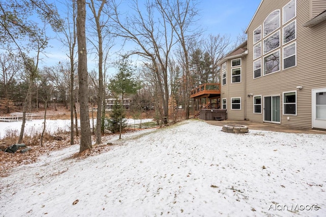 snowy yard with a fire pit