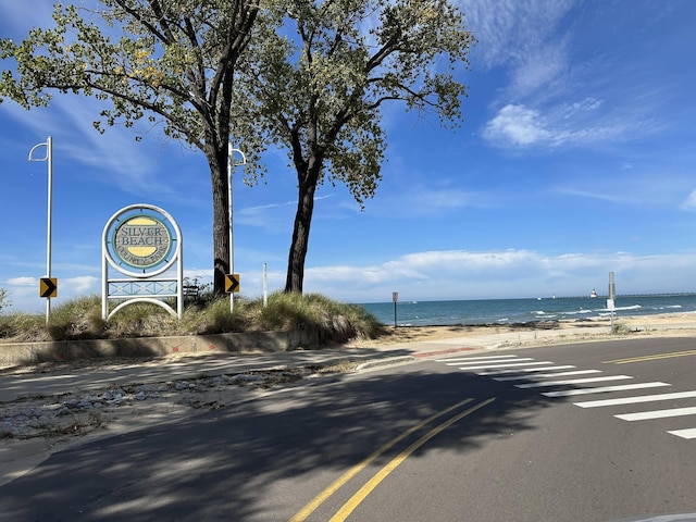 property view of water with a beach view