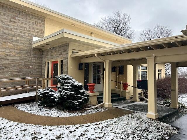 view of snow covered patio