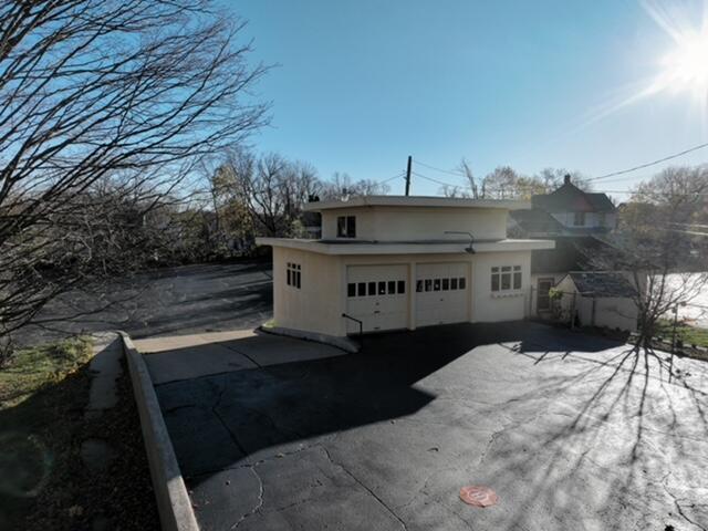 exterior space with a garage