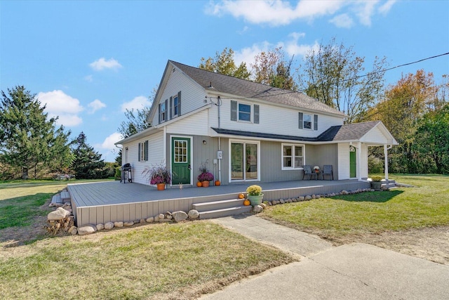 front facade with a front lawn