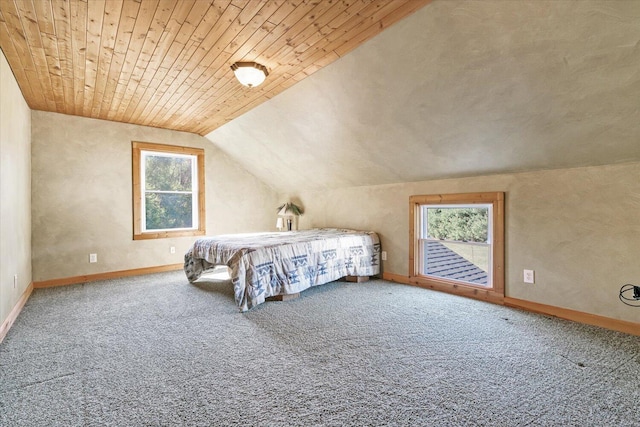 carpeted bedroom with lofted ceiling and wooden ceiling