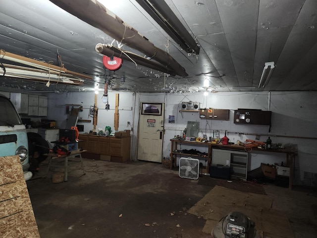 garage with a workshop area