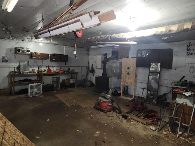 basement with a workshop area