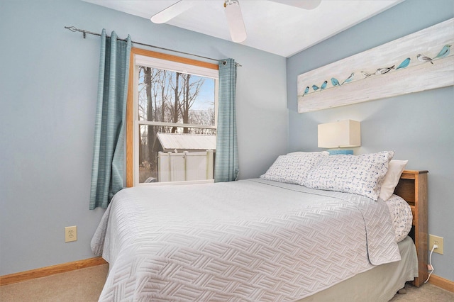 bedroom with light carpet and ceiling fan