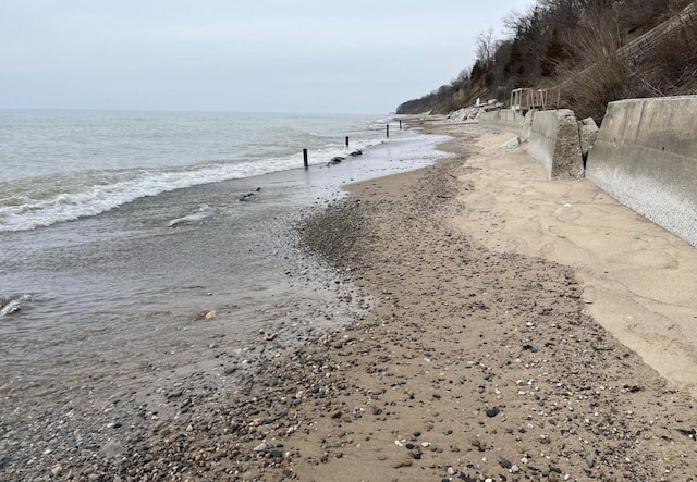 view of water feature featuring a beach view