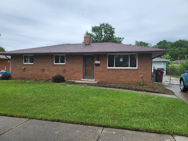 single story home with a front yard