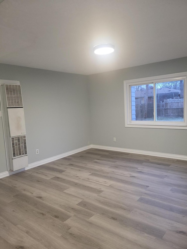 unfurnished room featuring light hardwood / wood-style floors